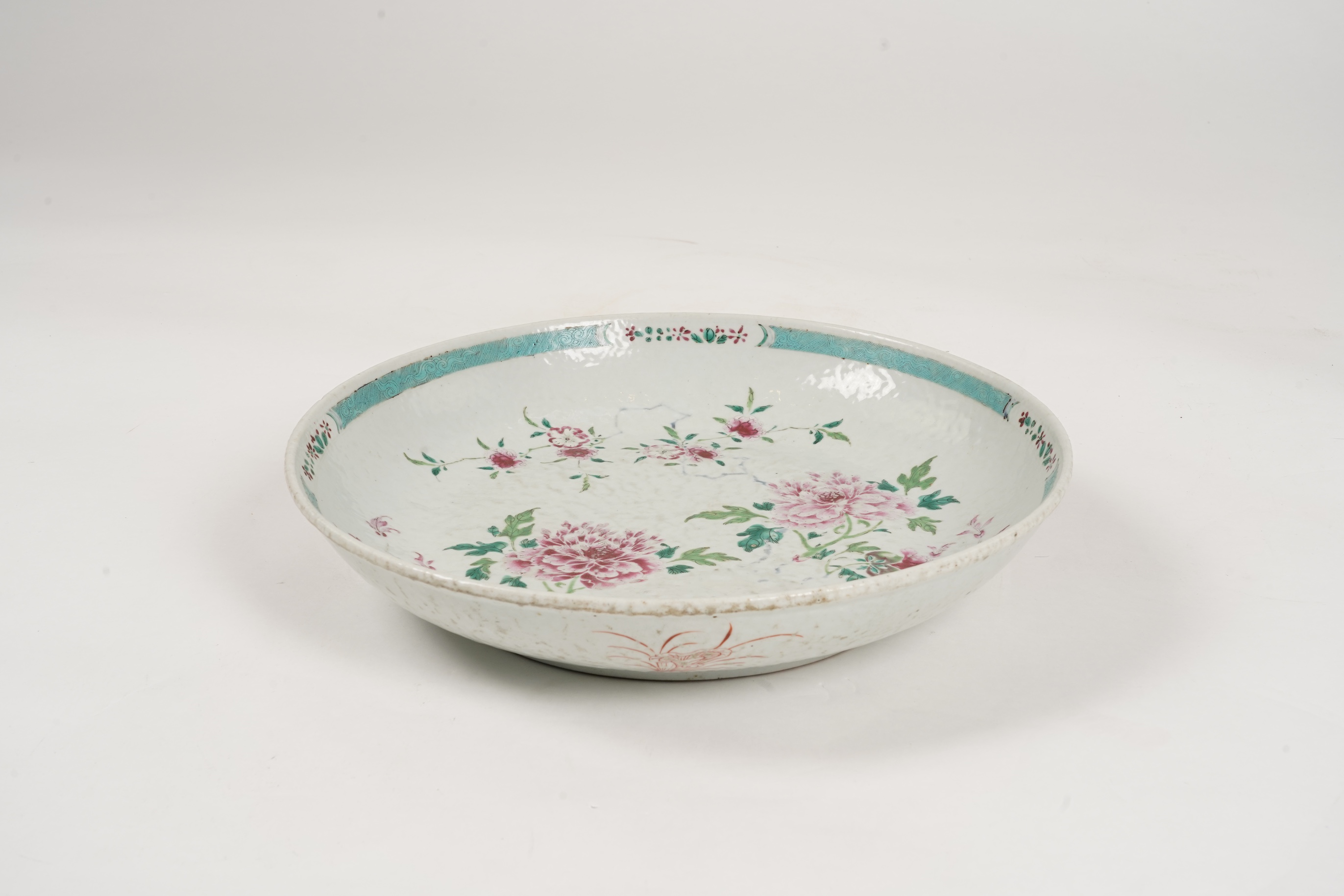 A Chinese export famille rose deep dish, underglaze blue Xuande mark but 18th century